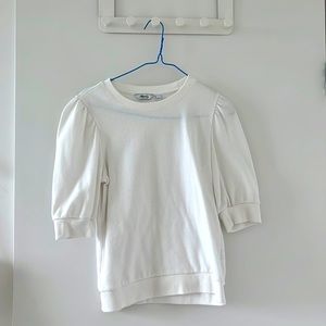 White top with mid length sleeves